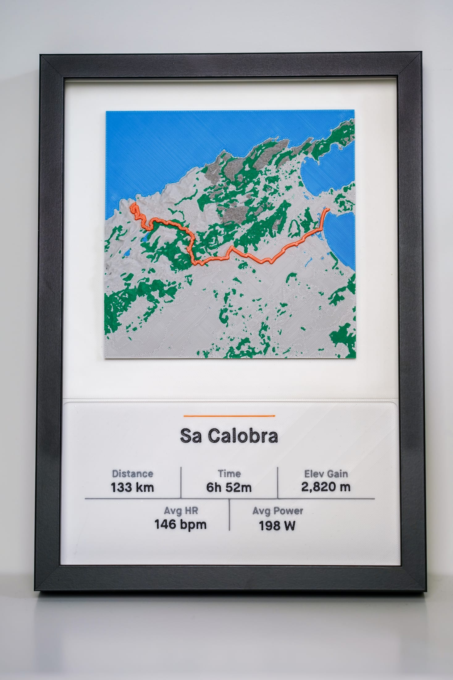 Straight-on photograph of the framed Sa Calobra full-terrain piece.